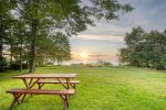 Enjoy a meal outside while watching the sun set over Lake Michigan